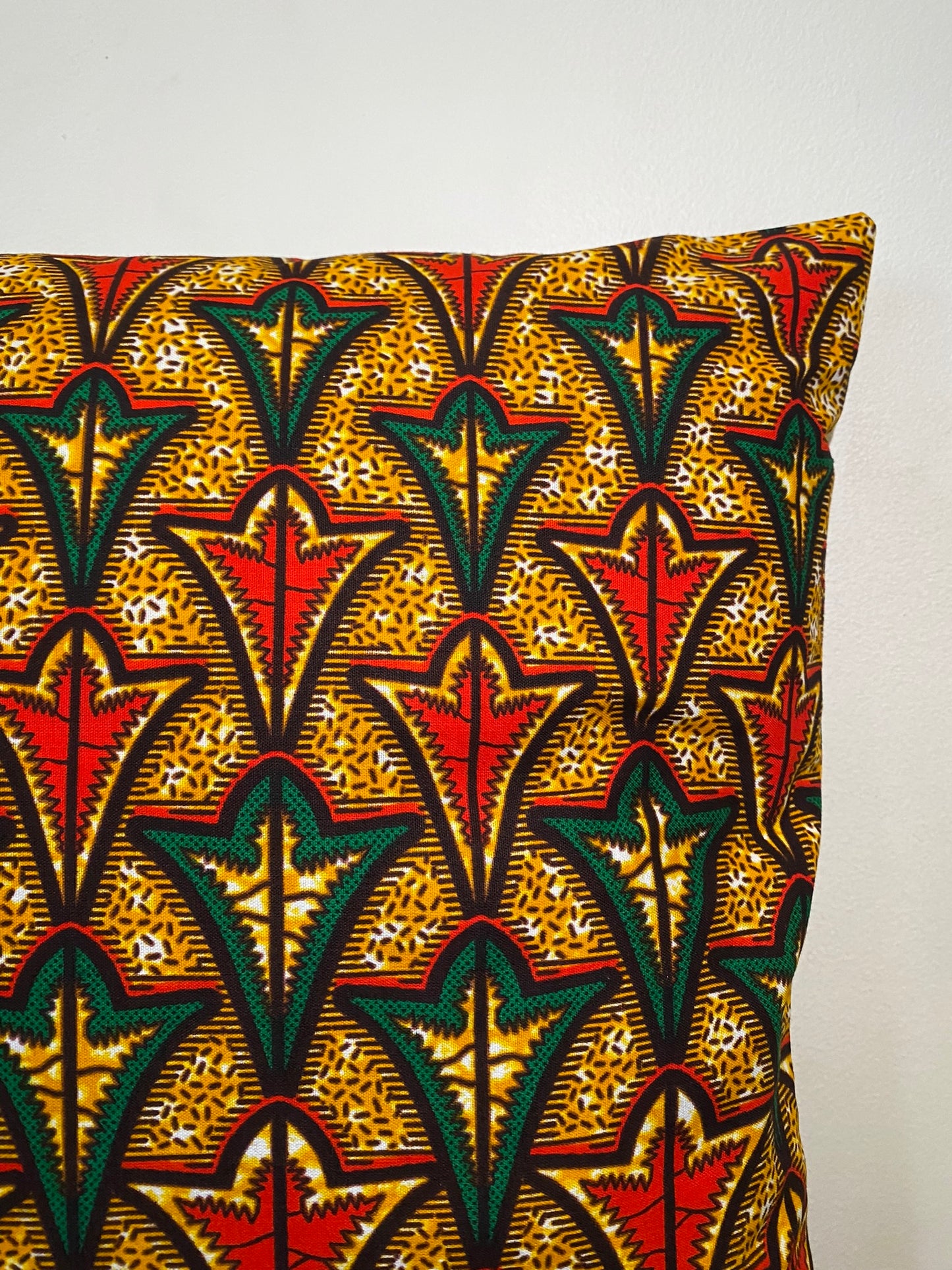 Housse de coussin wax n°128 - Motif Géométrique afro Orange Vert