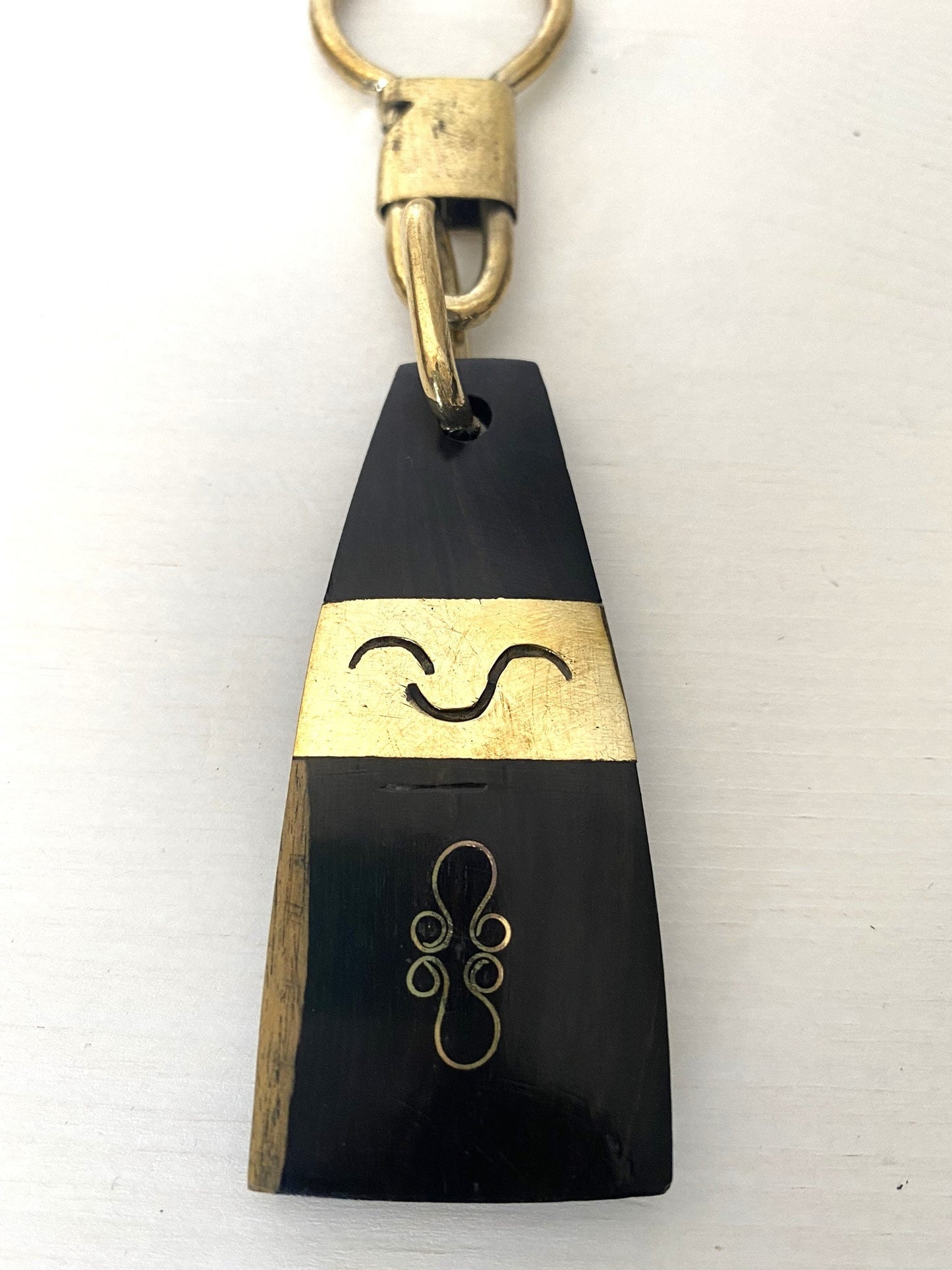 Handcrafted Afro keychain - ebony wood and brass - Trapezoid shape