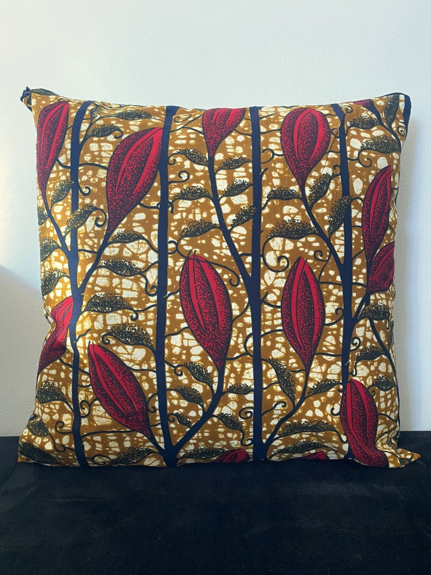 Housse de coussin wax n°124 - Floraison rouge sur Kaki